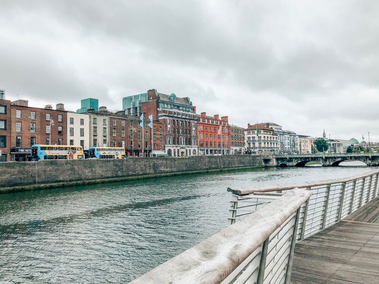 A view of buildings and water from the pier.