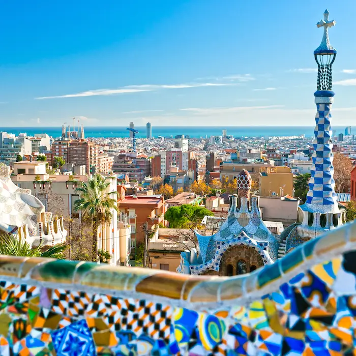Park Güell overlooking Barcelona cityscape.