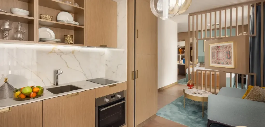 Modern kitchen and living area design.