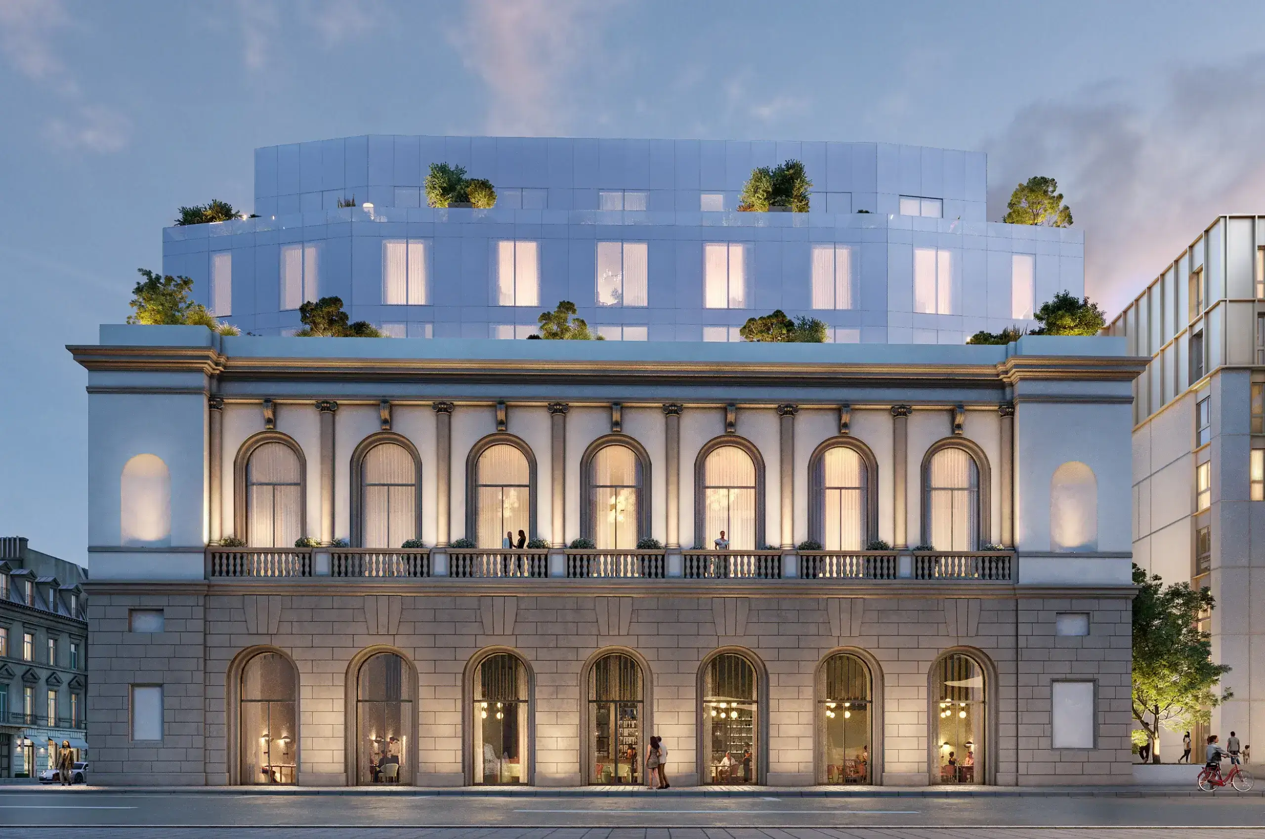 Historic building with modern rooftop addition.