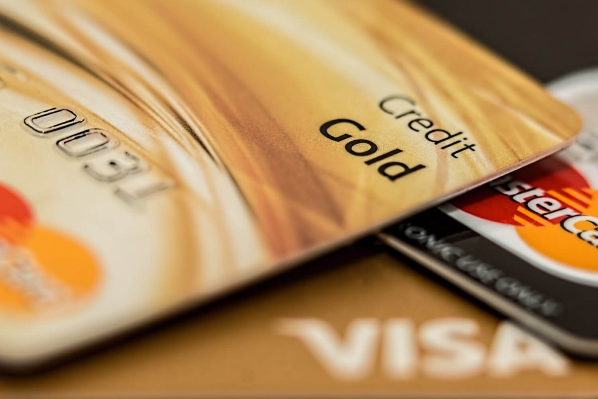 A close up of credit cards on top of each other.